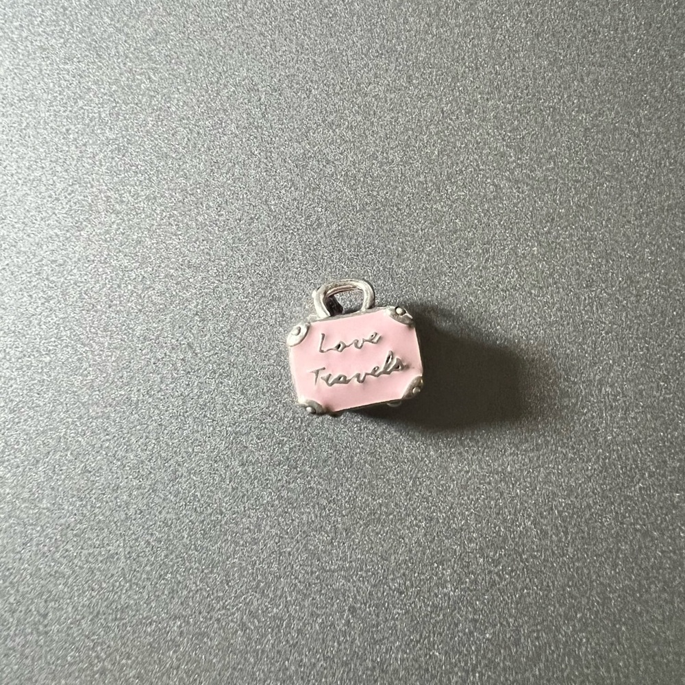 SOLD ON MERC Pandora Love Travels charm